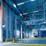 How can UK industry stay competitive with carbon pricing? Warehouse loading bay interior