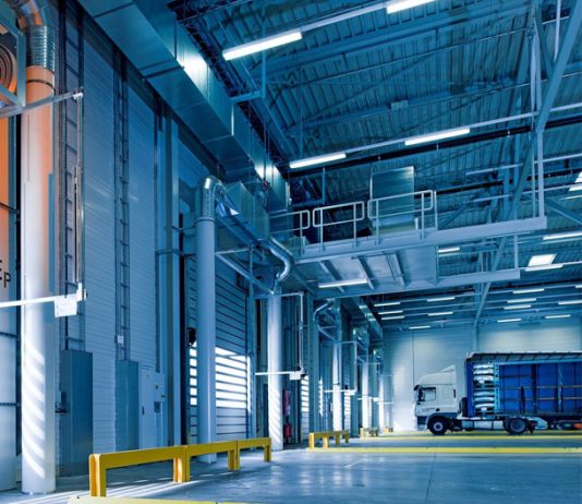 How can UK industry stay competitive with carbon pricing? Warehouse loading bay interior