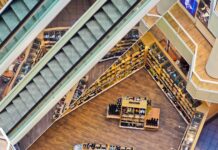 Energy efficient buildings see stronger ROI in commercial real estate, says CBRE study Looking down to lower floors in a shopping mall.