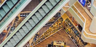 Energy efficient buildings see stronger ROI in commercial real estate, says CBRE study Looking down to lower floors in a shopping mall.