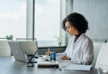 Environment Agency confirms enforcement approach for ESOS Action Plans A woman sits at her desk with her laptop while working on her ESOS Action Plan in time for the 5 March 2024 deadline