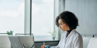 Environment Agency confirms enforcement approach for ESOS Action Plans A woman sits at her desk with her laptop while working on her ESOS Action Plan in time for the 5 March 2024 deadline