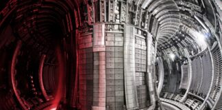 UK government announces £410 million investment in fusion energy Interior of JET with a superimposed plasma