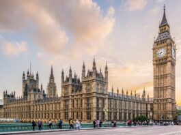 UK government relaunches Net Zero Council to support green transition Big Ben and parliament from across the street as the sun sets behind