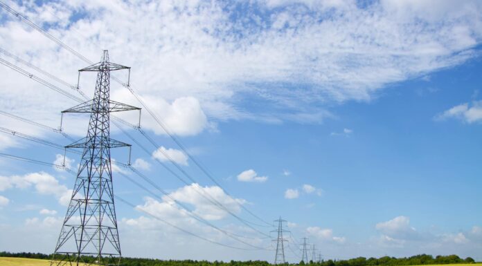UK Industrial Strategy targets cheaper energy, faster grid access, and green growth Scenic View of Power Lines in English Countryside