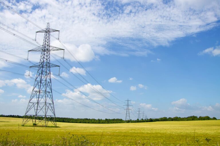 Scenic View of Power Lines in English Countryside