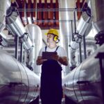 Heat networks explained: Insight from the latest Sustainably Speaking podcast technician with large pipes network