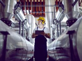 Heat networks explained: Insight from the latest Sustainably Speaking podcast technician with large pipes network