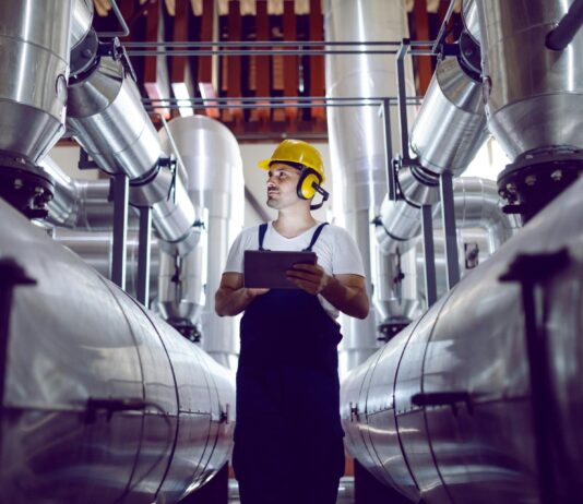 Heat networks explained: Insight from the latest Sustainably Speaking podcast technician with large pipes network