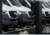 Government extends electric van and truck grants to 2027 A row of commercial electric vans are charging