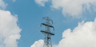 TNUoS charges set to rise higher than previously forecast UK energy pylon and blue sky background