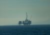 How does the Iran conflict affect energy prices in the UK? oil rig in the open sea