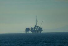 How does the Iran conflict affect energy prices in the UK? oil rig in the open sea
